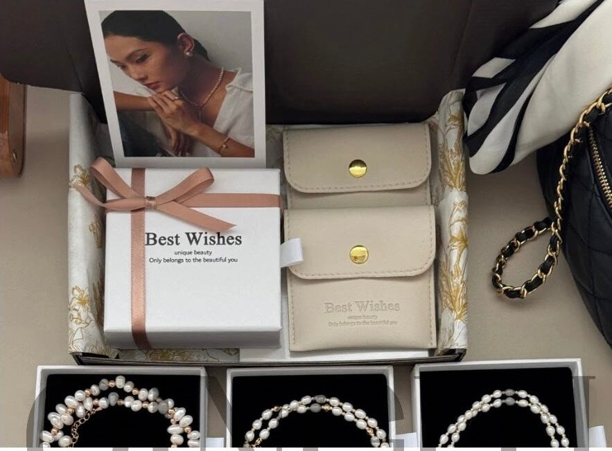 Flat lay of sterling silver pearl bracelet in elegant packaging, perfect for gifting