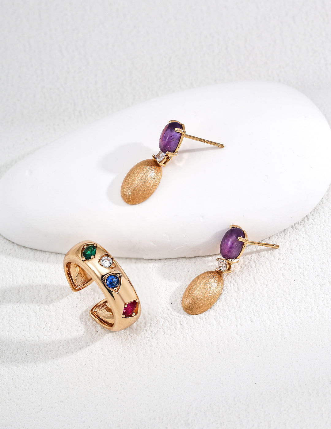 side view of 925 silver dangle earrings with purple amethyst