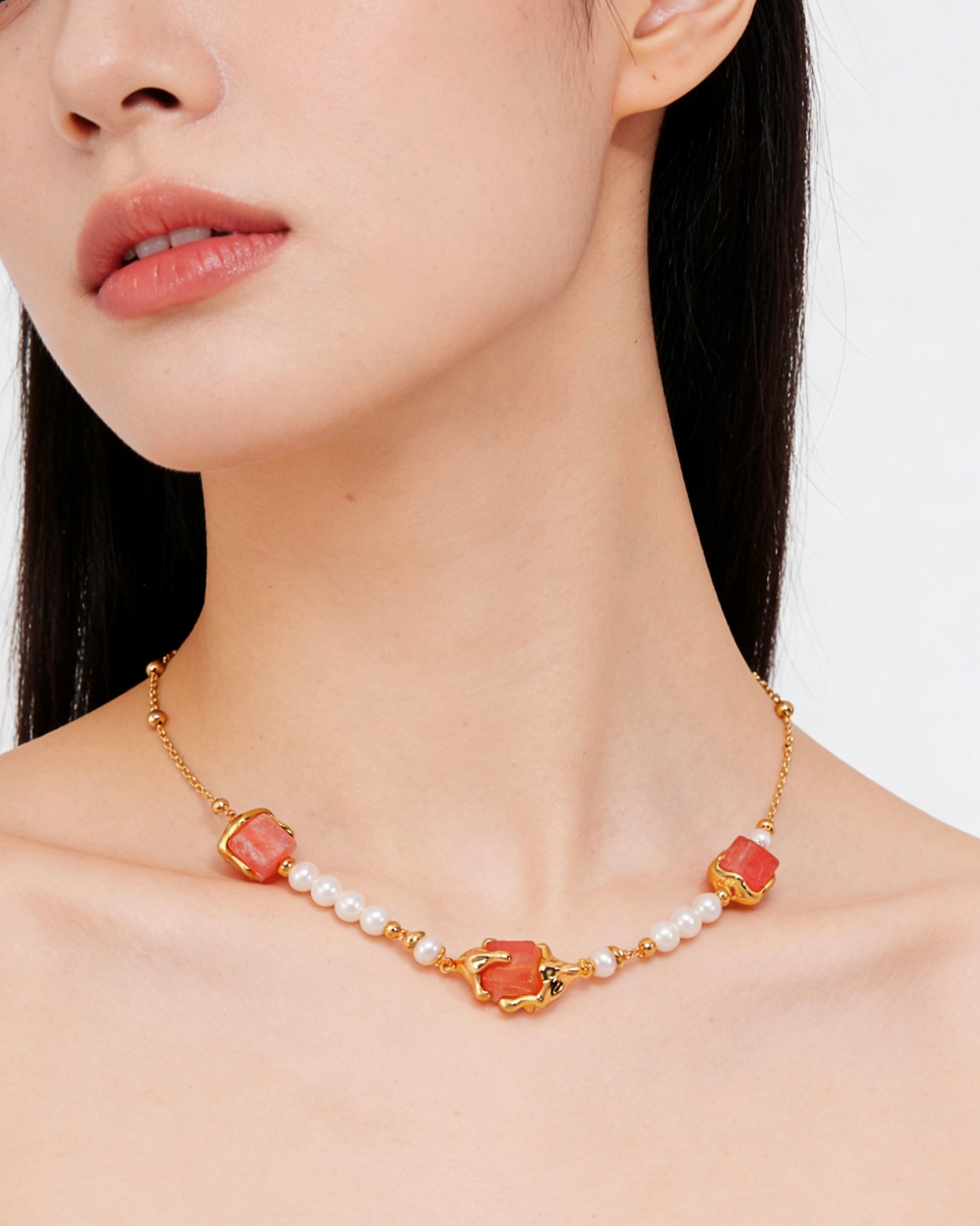 Woman wearing 925 silver cubic crystal and pearl necklace geometric pendant